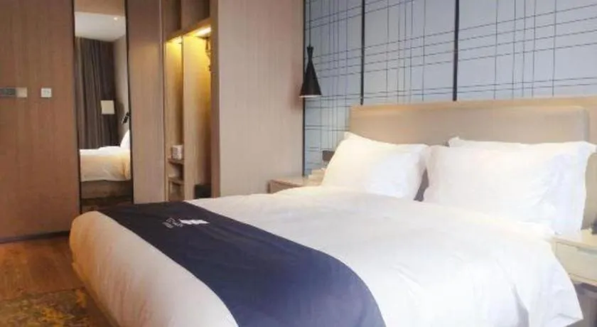 Bed in Echarm Hotel Liuzhou High-speed Railway Station