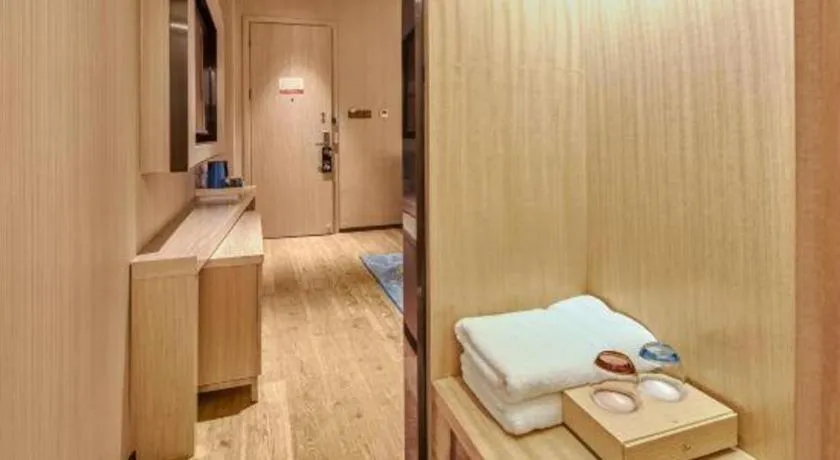 Bed in Echarm Hotel Liuzhou High-speed Railway Station