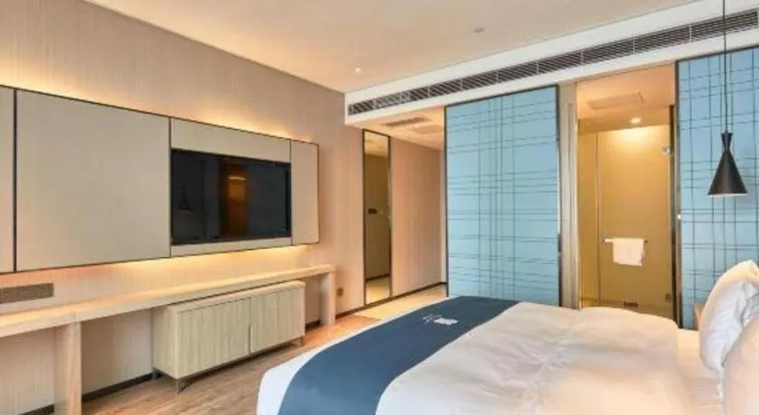 Bed in Echarm Hotel Liuzhou High-speed Railway Station