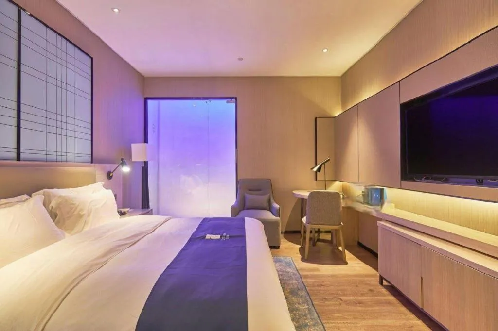 Bed in Echarm Hotel Liuzhou High-speed Railway Station