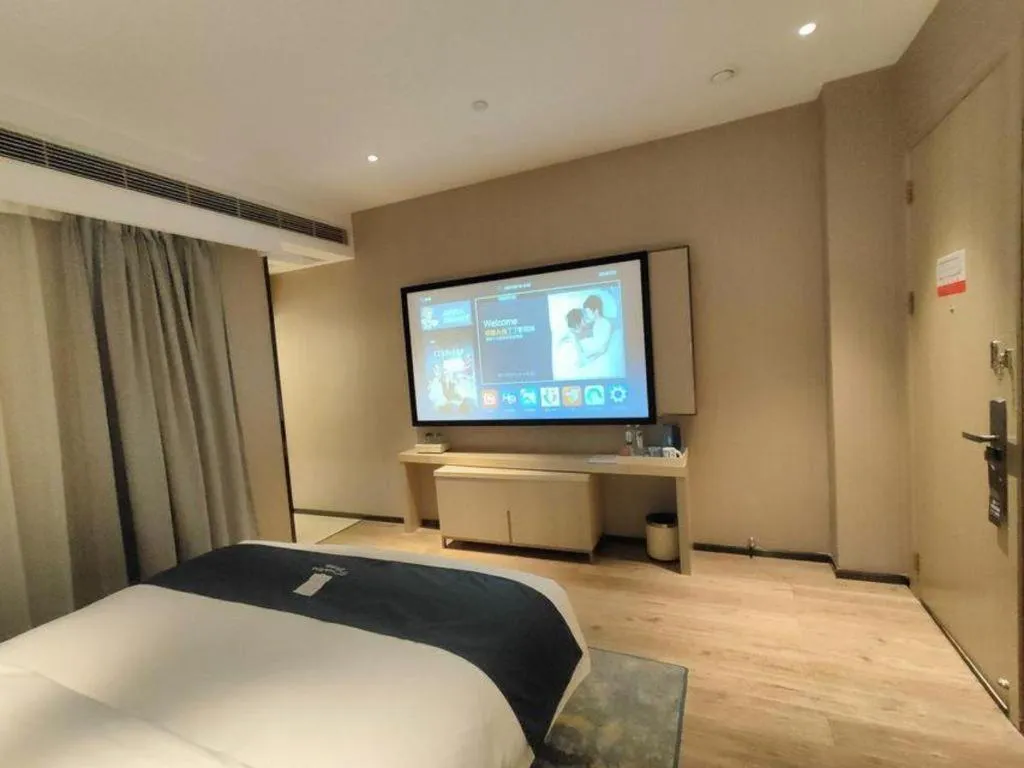 Bed in Echarm Hotel Liuzhou High-speed Railway Station