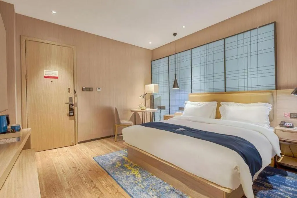Bed in Echarm Hotel Liuzhou High-speed Railway Station