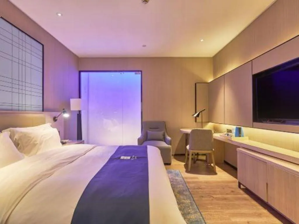 Bed in Echarm Hotel Liuzhou High-speed Railway Station