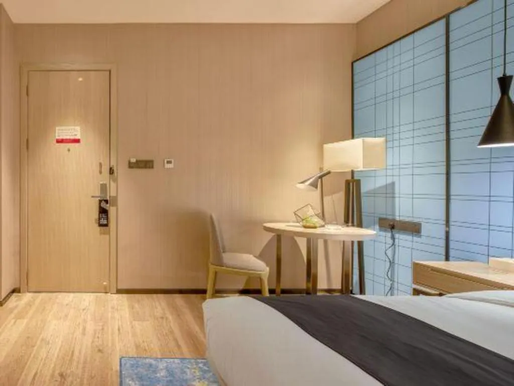 Bed in Echarm Hotel Liuzhou High-speed Railway Station