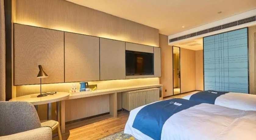 Bed in Echarm Hotel Liuzhou High-speed Railway Station
