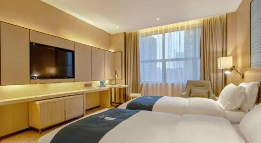 Bed in Echarm Hotel Liuzhou High-speed Railway Station