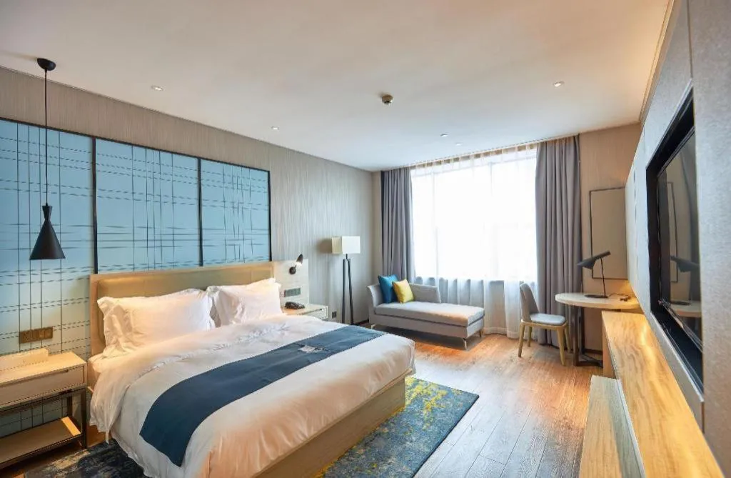 Bed in Echarm Hotel Liuzhou High-speed Railway Station