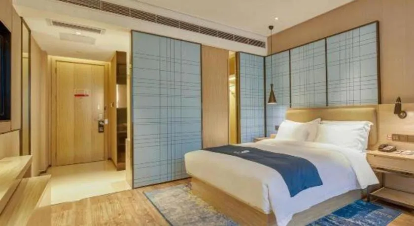 Bed in Echarm Hotel Liuzhou High-speed Railway Station