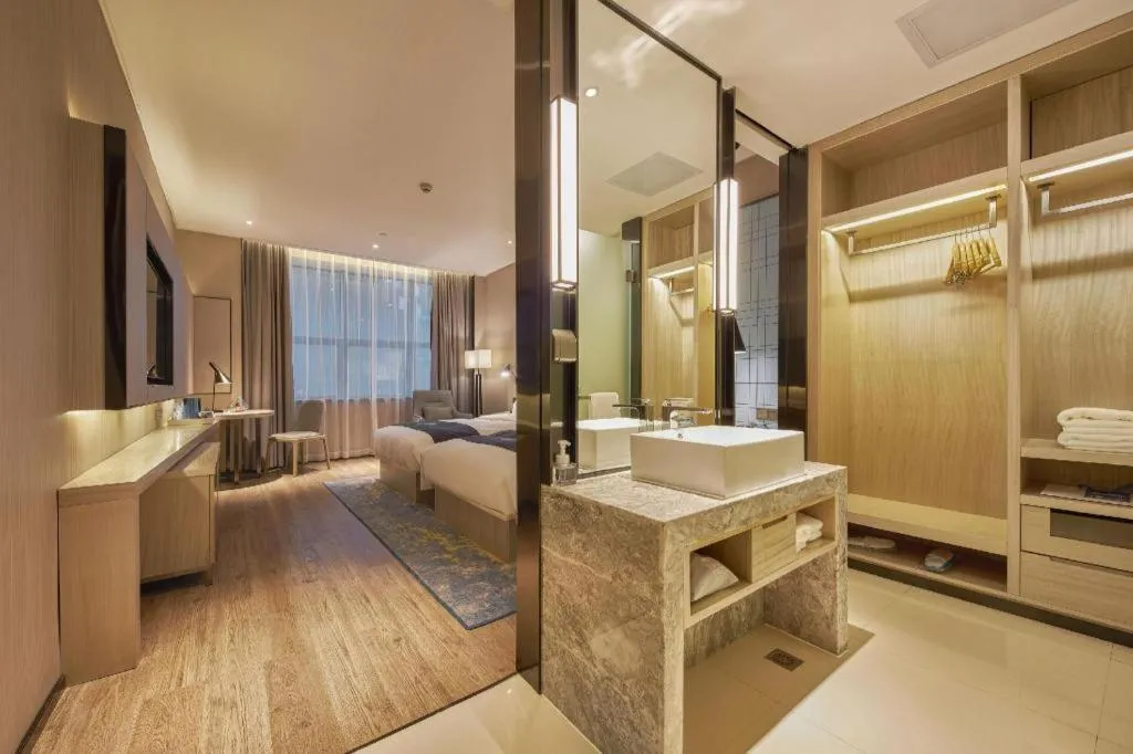 Bed in Echarm Hotel Liuzhou High-speed Railway Station