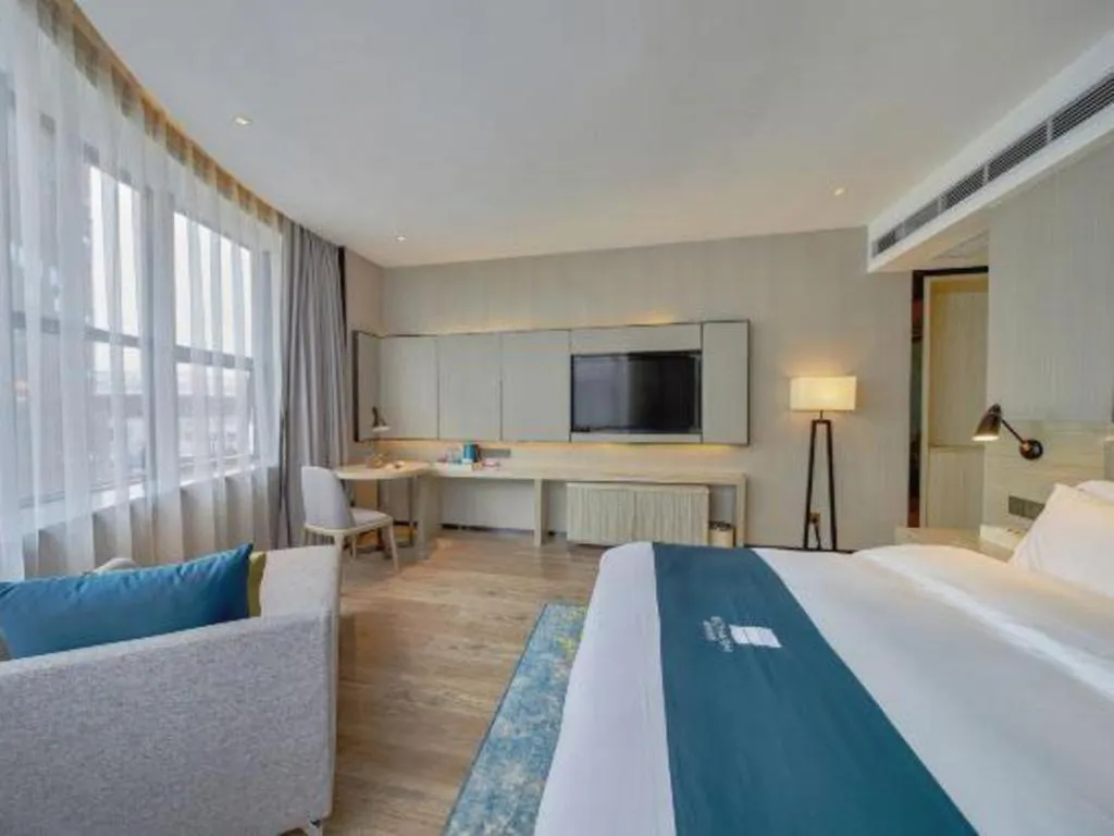 Bed in Echarm Hotel Liuzhou High-speed Railway Station