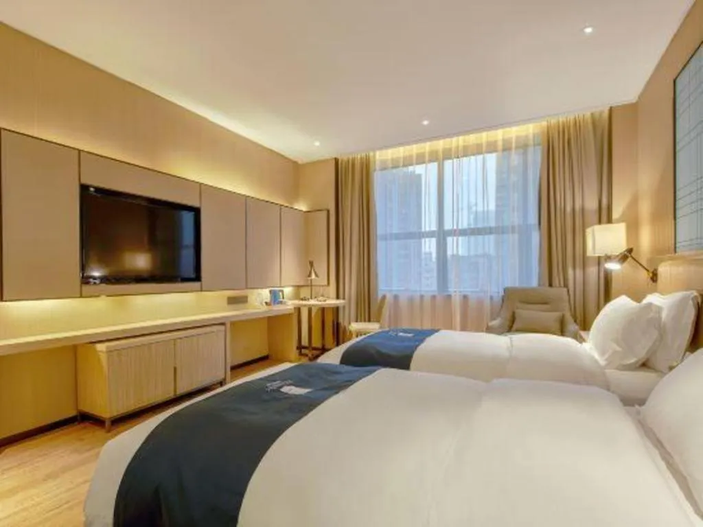 Bed in Echarm Hotel Liuzhou High-speed Railway Station
