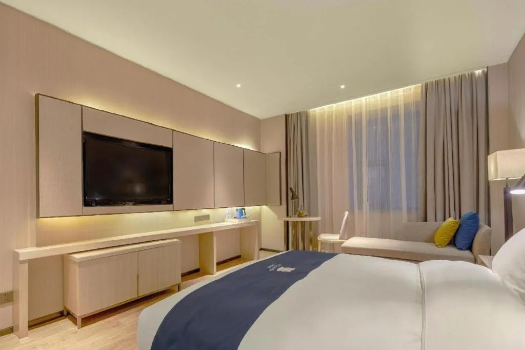 Bed in Echarm Hotel Liuzhou High-speed Railway Station