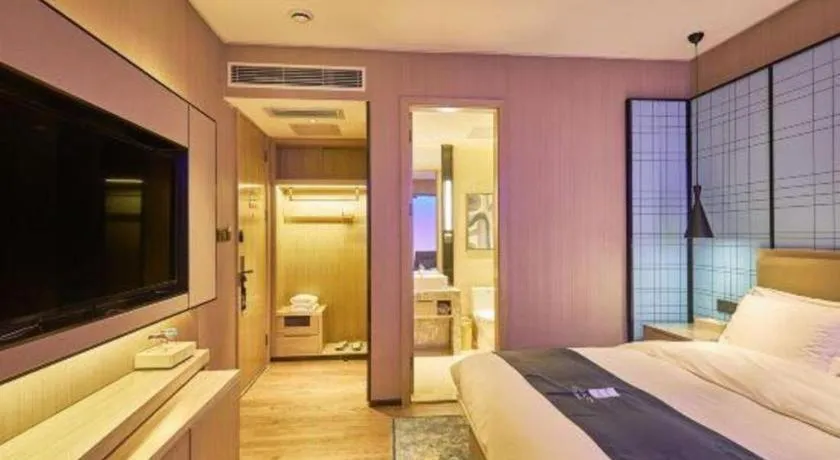 Bed in Echarm Hotel Liuzhou High-speed Railway Station