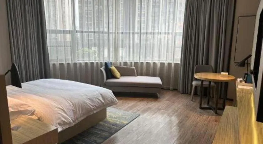 Bed in Echarm Hotel Liuzhou High-speed Railway Station