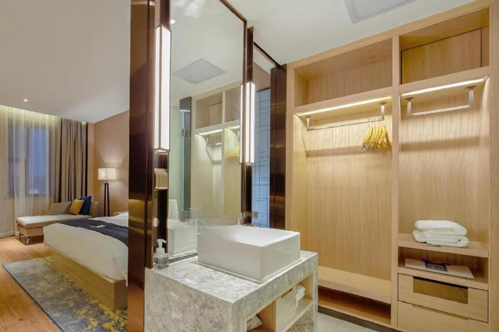 Bed in Echarm Hotel Liuzhou High-speed Railway Station