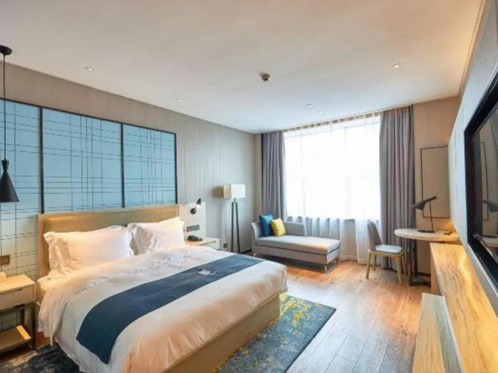 Bed in Echarm Hotel Liuzhou High-speed Railway Station