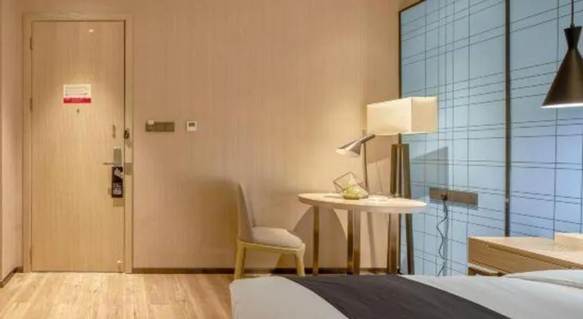 Bed in Echarm Hotel Liuzhou High-speed Railway Station