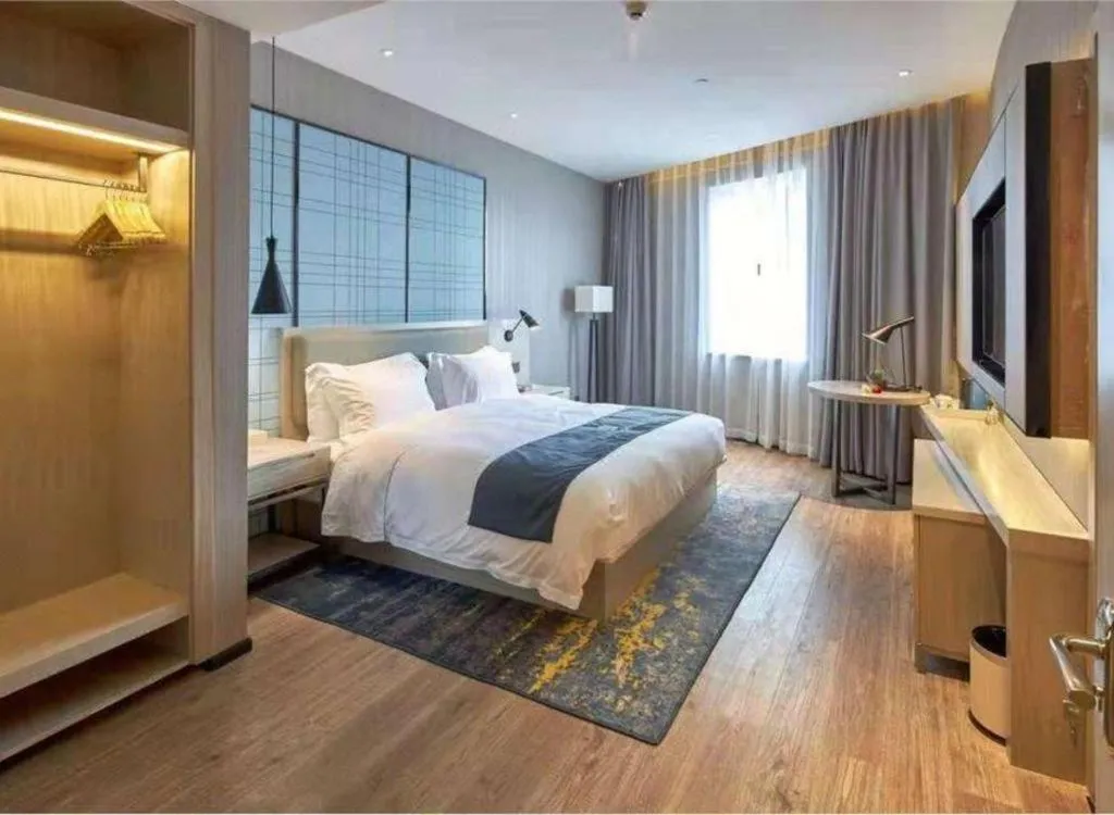 Bed in Echarm Hotel Liuzhou High-speed Railway Station