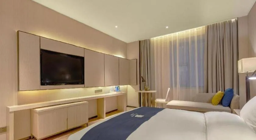 Bed in Echarm Hotel Liuzhou High-speed Railway Station