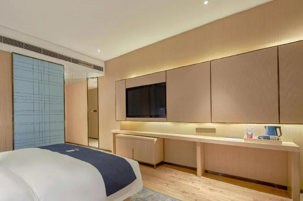 Bed in Echarm Hotel Liuzhou High-speed Railway Station