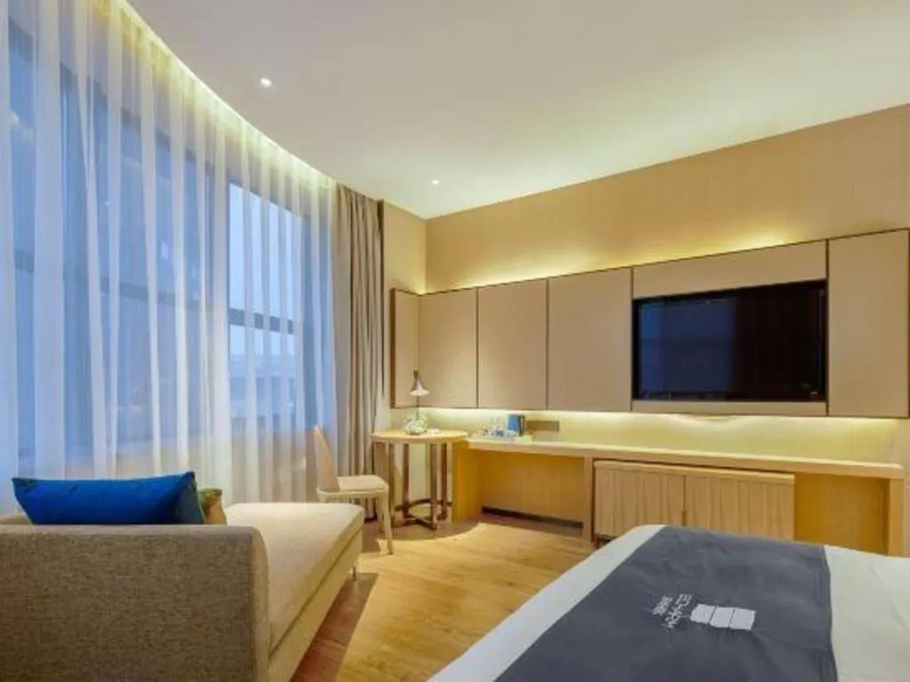 Bed in Echarm Hotel Liuzhou High-speed Railway Station