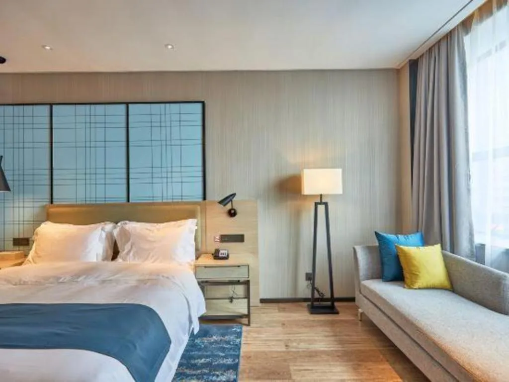 Bed in Echarm Hotel Liuzhou High-speed Railway Station