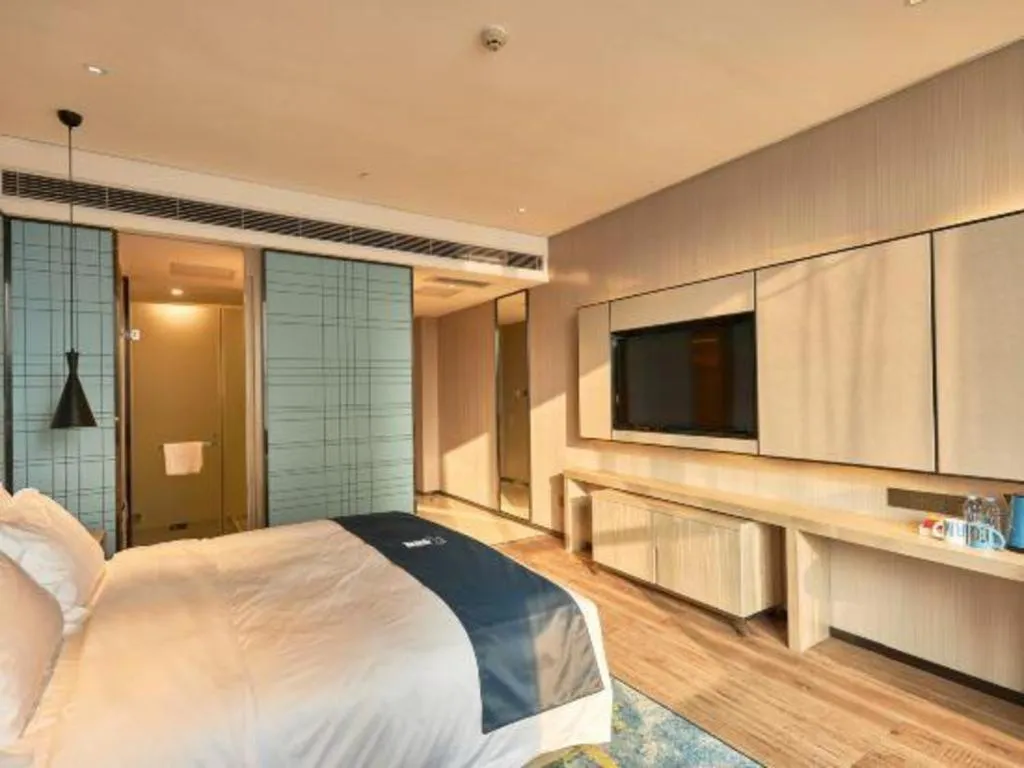 Bed in Echarm Hotel Liuzhou High-speed Railway Station