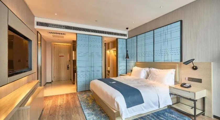 Bed in Echarm Hotel Liuzhou High-speed Railway Station