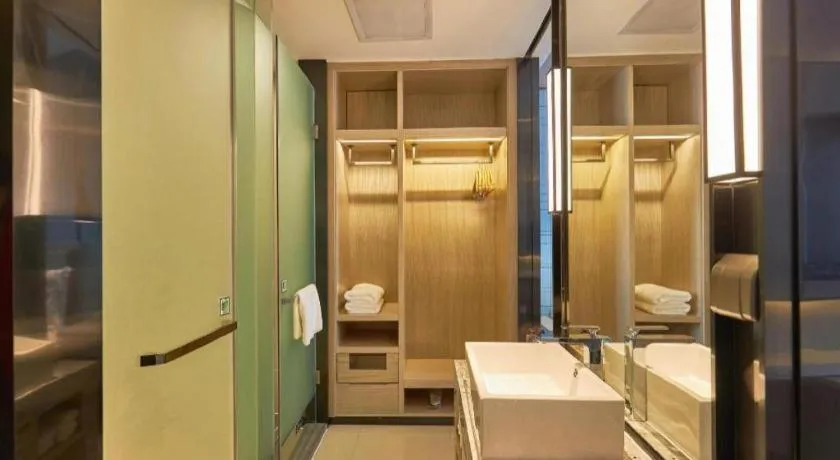 Bed in Echarm Hotel Liuzhou High-speed Railway Station