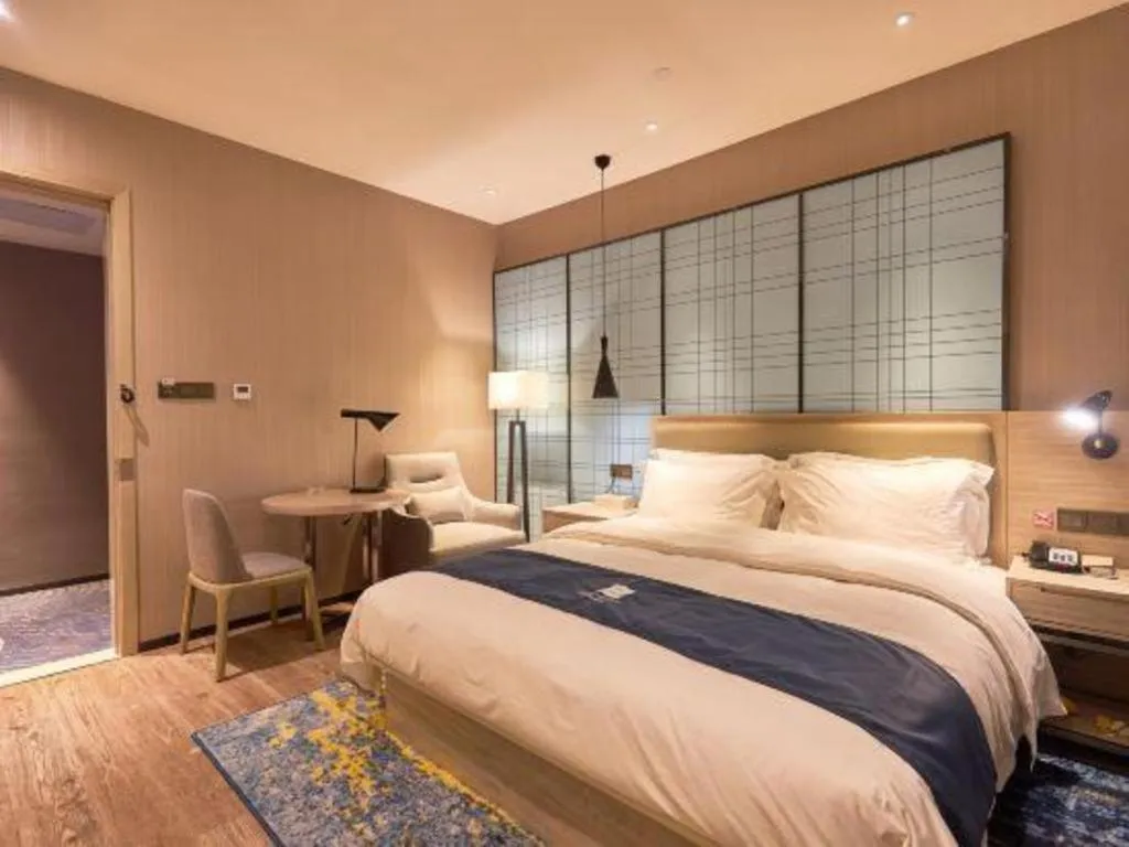 Bed in Echarm Hotel Liuzhou High-speed Railway Station