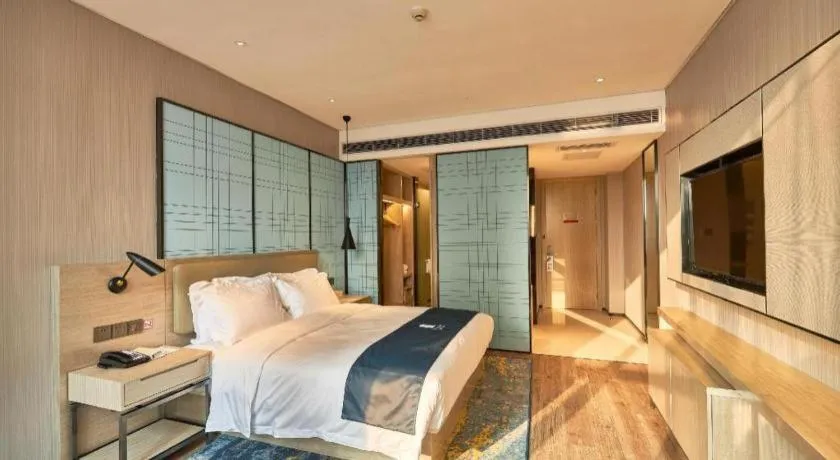 Bed in Echarm Hotel Liuzhou High-speed Railway Station