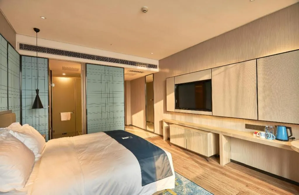 Bed in Echarm Hotel Liuzhou High-speed Railway Station