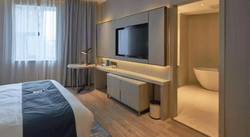 Bed in Echarm Hotel Liuzhou High-speed Railway Station