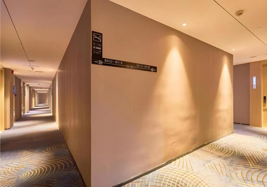 Bed in Echarm Hotel Liuzhou High-speed Railway Station