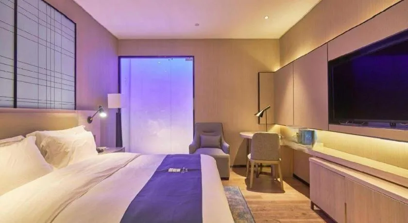 Bed in Echarm Hotel Liuzhou High-speed Railway Station