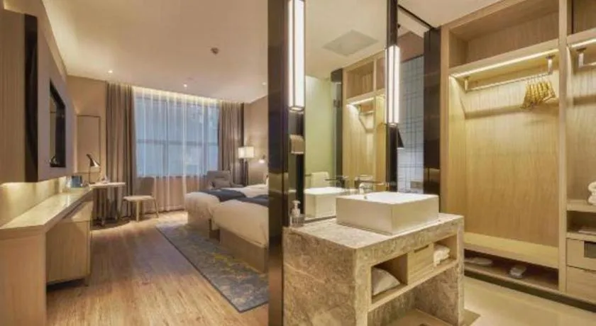 Bed in Echarm Hotel Liuzhou High-speed Railway Station