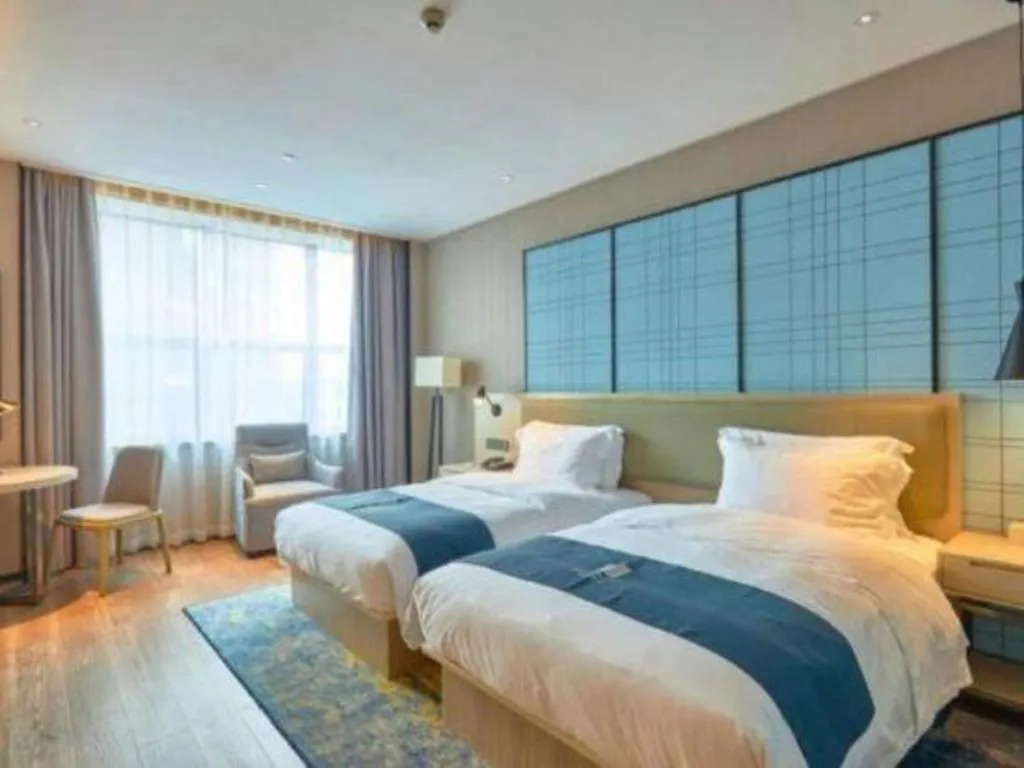 Bed in Echarm Hotel Liuzhou High-speed Railway Station
