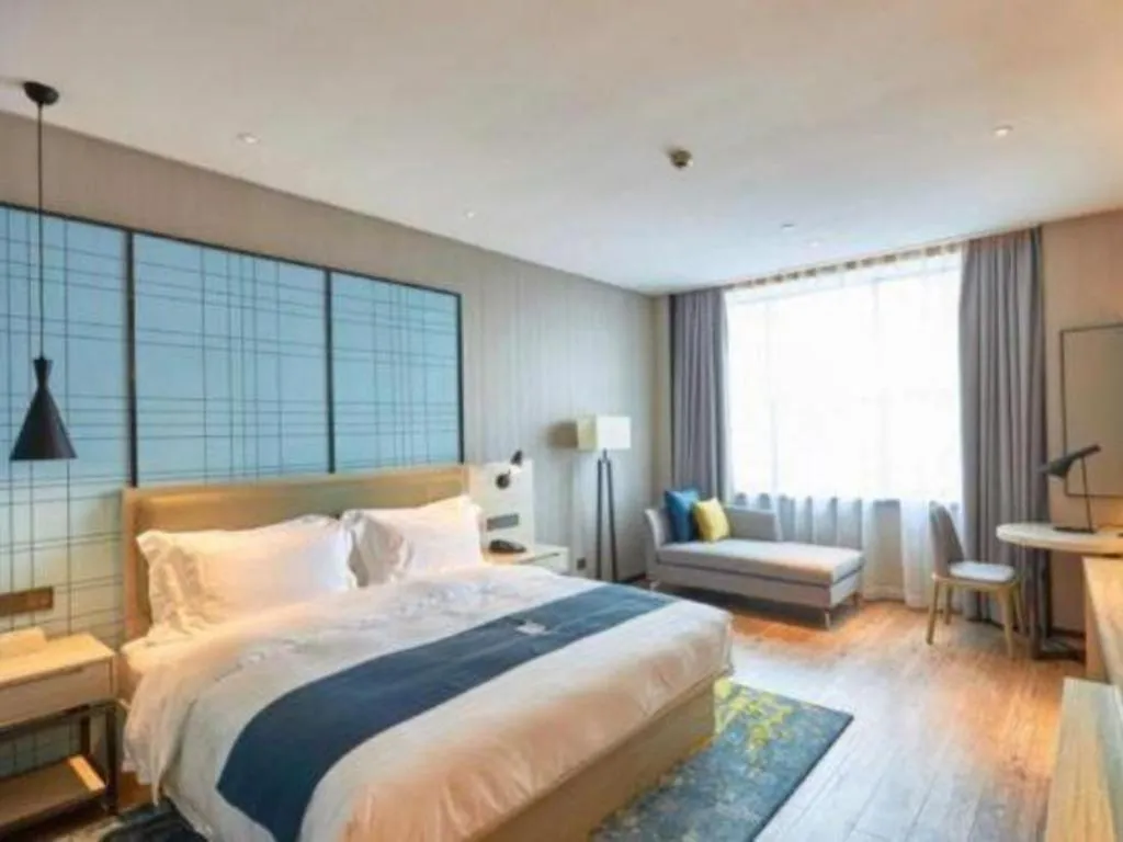 Bed in Echarm Hotel Liuzhou High-speed Railway Station