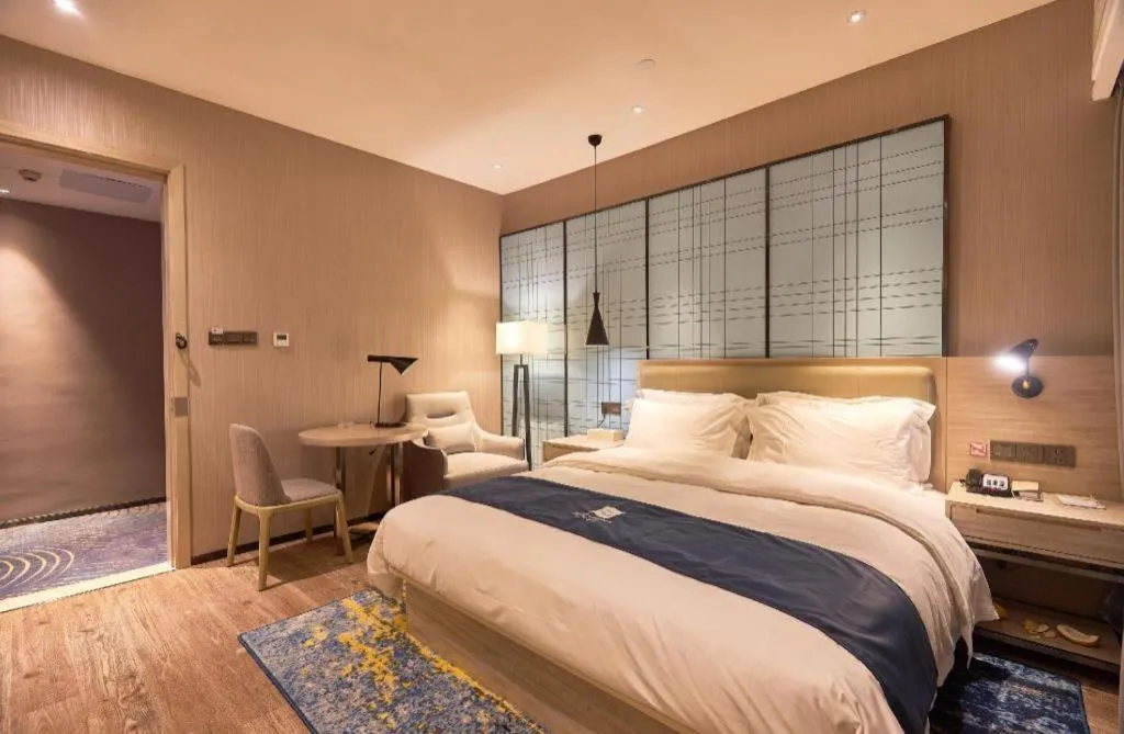 Bed in Echarm Hotel Liuzhou High-speed Railway Station