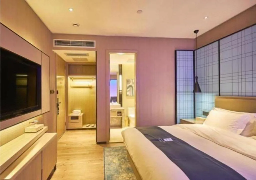 Bed in Echarm Hotel Liuzhou High-speed Railway Station