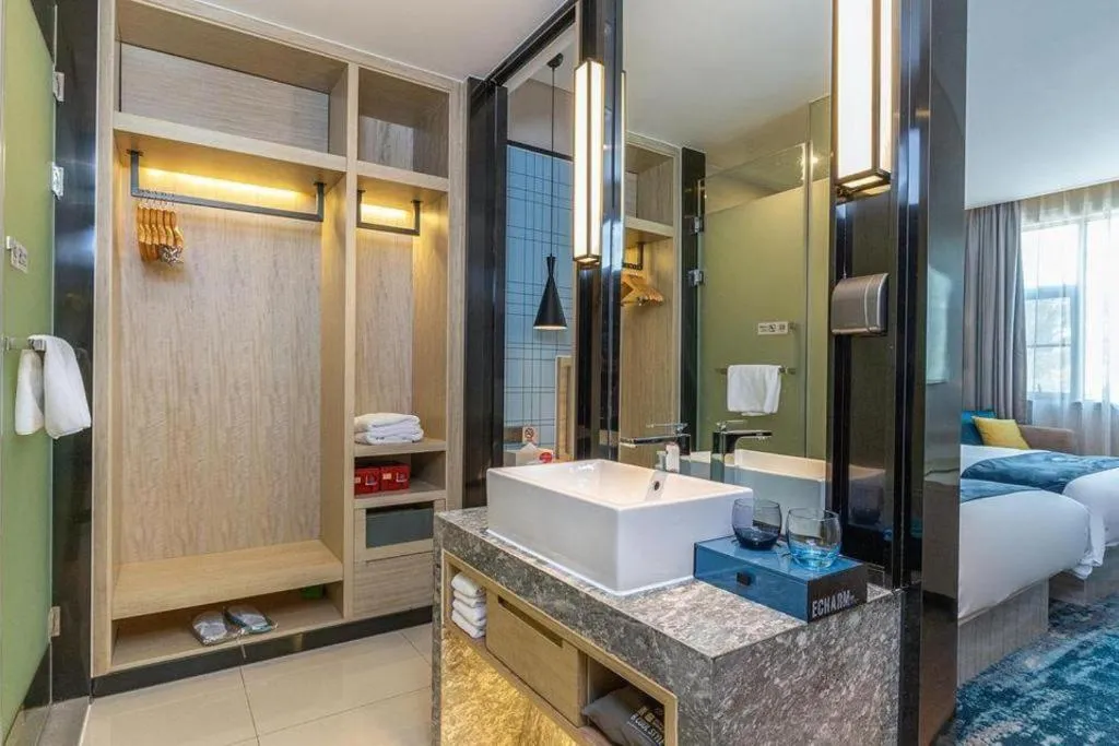 Bed in Echarm Hotel Nanning Qingxiu Mountain