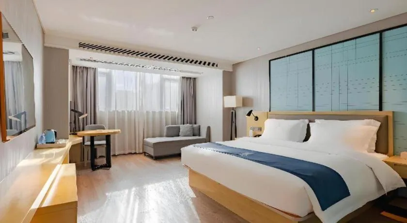 Bed in Echarm Hotel Nanning Qingxiu Mountain
