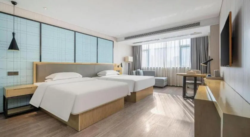 Bed in Echarm Hotel Nanning Qingxiu Mountain