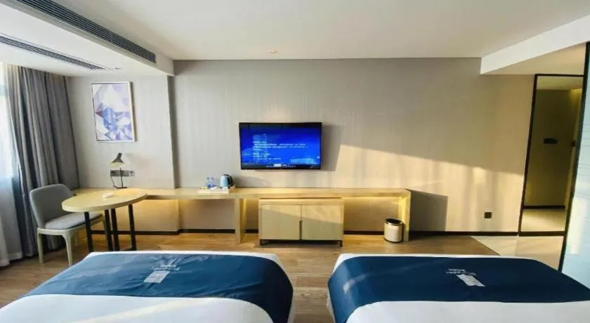 Bed in Echarm Hotel Nanning Qingxiu Mountain