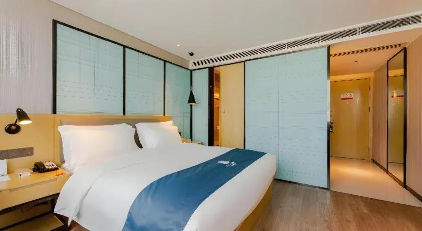 Bed in Echarm Hotel Nanning Qingxiu Mountain