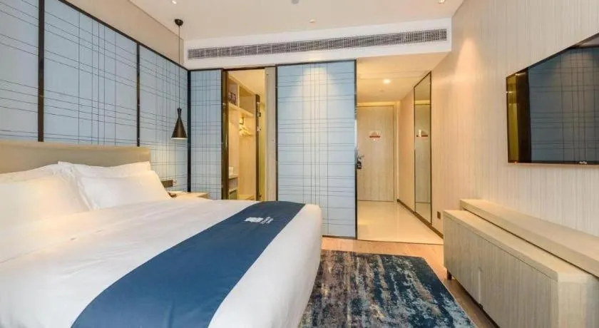 Bed in Echarm Hotel Nanning Qingxiu Mountain