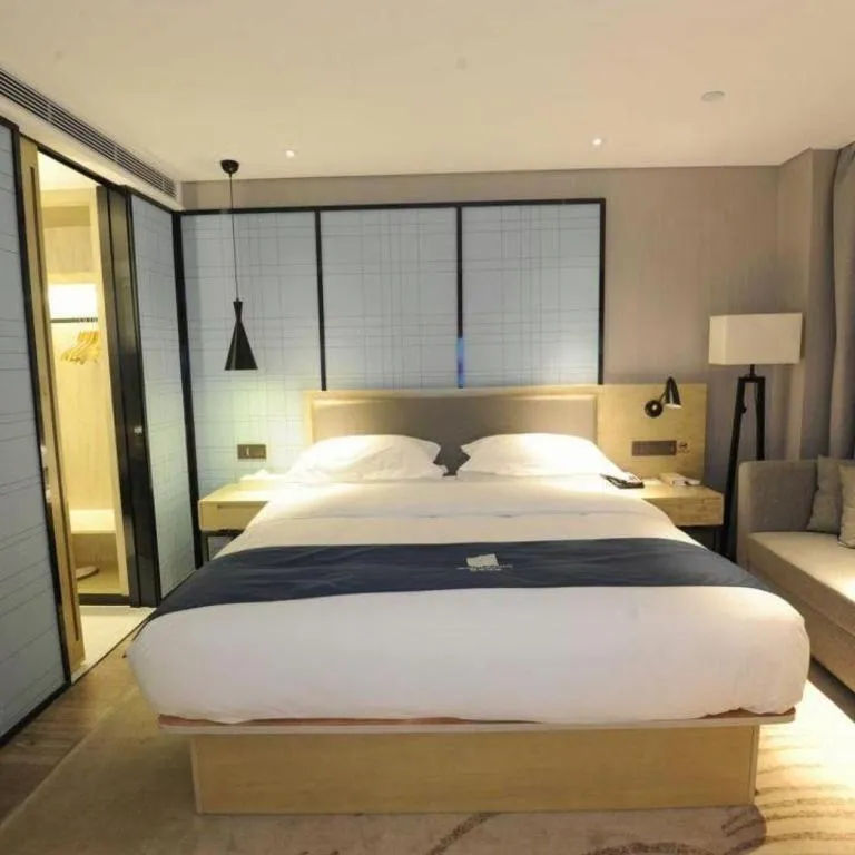 Bed in Echarm Hotel Nanning Qingxiu Mountain