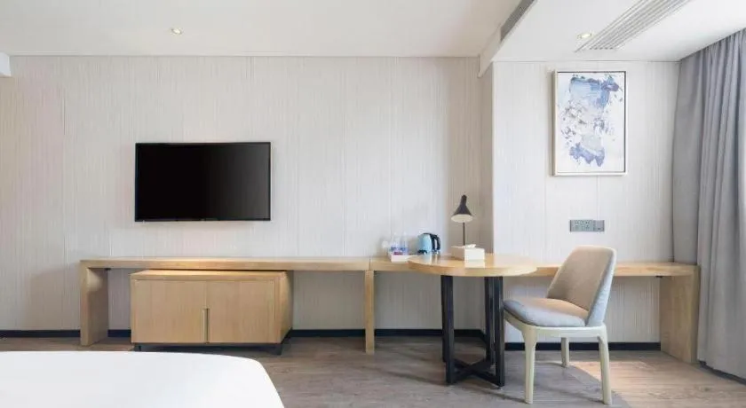 Bed in Echarm Hotel Nanning Qingxiu Mountain