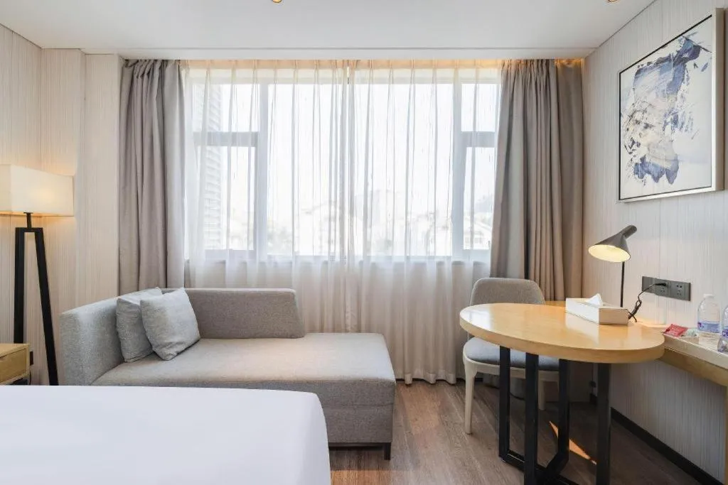 Bed in Echarm Hotel Nanning Qingxiu Mountain