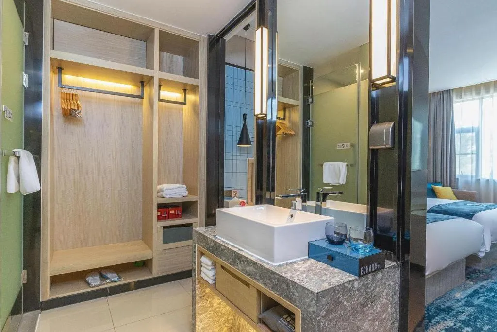 Bed in Echarm Hotel Nanning Qingxiu Mountain